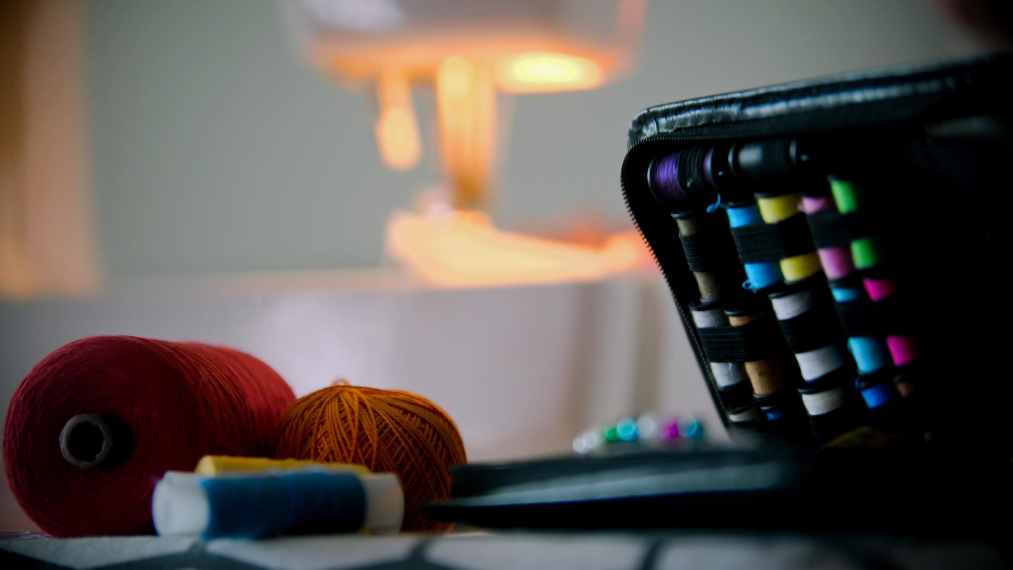studio workbench with threads and machine